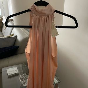 Blush top with bow in back